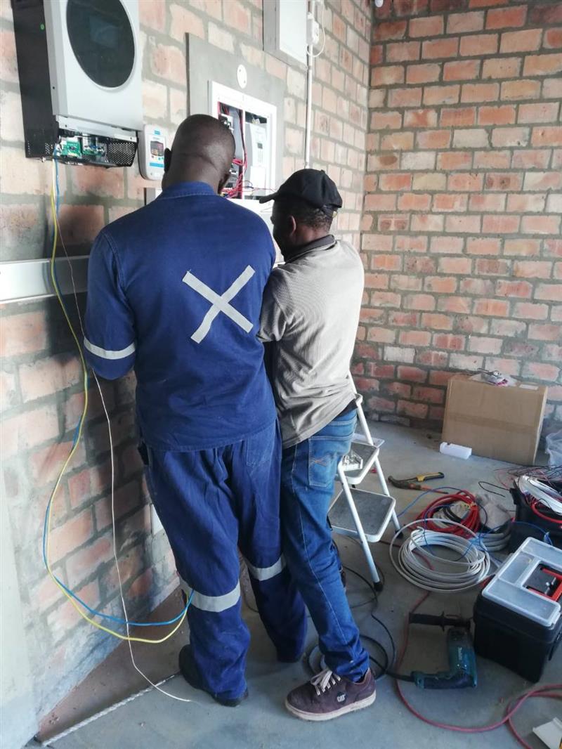Electrical team wiring inverter and distribution board equipment