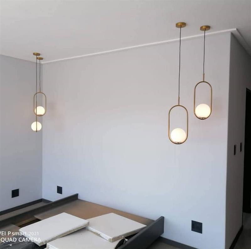 Pendant lights installed in a bedroom