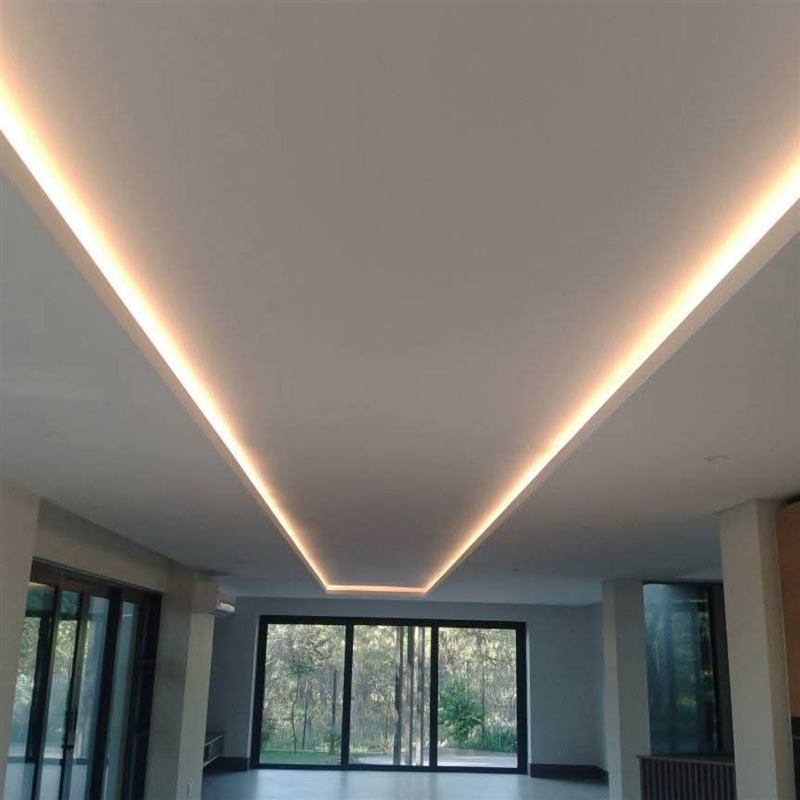 Warm LED ceiling lighting installed in a finished room